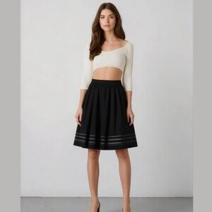 Black skirt. Striped sheer bottom. Medium